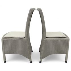 Neptune – Sheldrake limed oak extendable dining table and eight Havan loom chairs, the oval top in limed oak finish with four additional leaves extending the table to seat up to ten (Extends to cm), raised on turned legs with two additional centre supports, the matching Havan loom chairs finished in grey with cream upholstered seat covers (H 95cm, W 47cm, D 55cm)