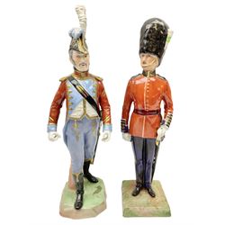 Two Napoleonic Dresden figures, comprising The Welsh Guards example and another in red coat in striding pose, with feathers to his hat and gilded throughout, H29cm
