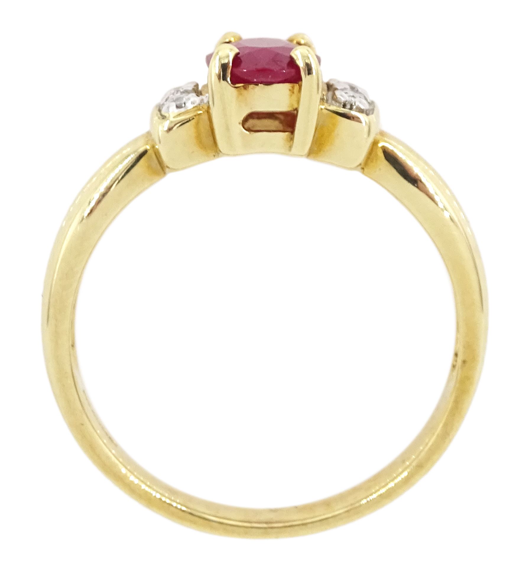 9ct gold single oval cut ruby and four stone, round brilliant cut diamond ring, hallmarked, ruby approx 0.75 carat