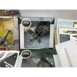 Fourteen die-cast models of aircraft including four Oxford Aviation, two Military Giants of the Sky, two Ixo Models, Corgi Warbirds Messerschmitt, Atlas Editions Spitfire and Messerschmitt, two Hobby Master etc; and two die-cast models of tanks; all boxed (16)