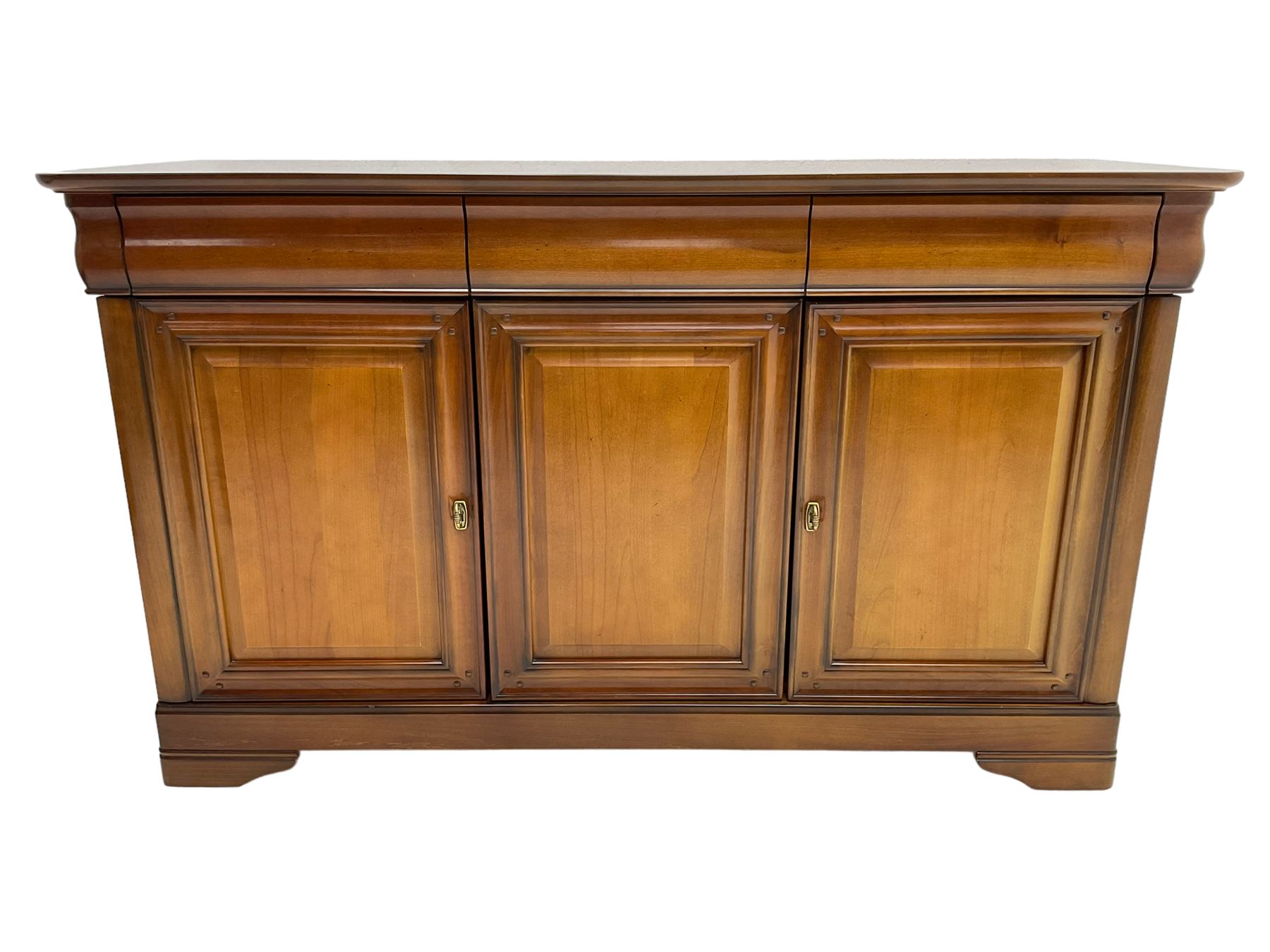 Cherry wood sideboard, fitted with three cushion drawers over three panelled cupboard doors, on bracket feet