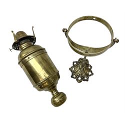 Brass oil lamp with wall bracket modelled with a fish