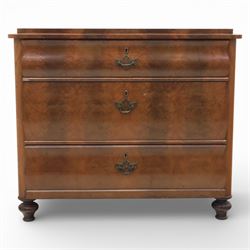 Late Victorian walnut and burr walnut chest of drawers, moulded top with rounded corners, finely figured burr walnut drawer fronts arranged as three long drawers, brass batwing handle plates, the lower section raised on turned bun feet