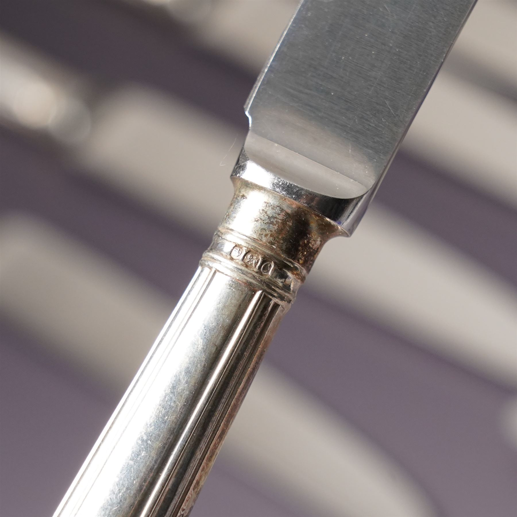 Set of twelve Elizabeth II silver handled double thread pattern table knives and twelve matching dessert knives Sheffield 1967 Maker C J Vander Ltd and a set of twelve matching silver handled pastry knives Sheffield 1970 Maker C J Vander Ltd (36) 