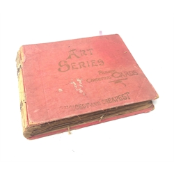  Victorian scrap book containing various cuttings and small greetings cards, all glued down  