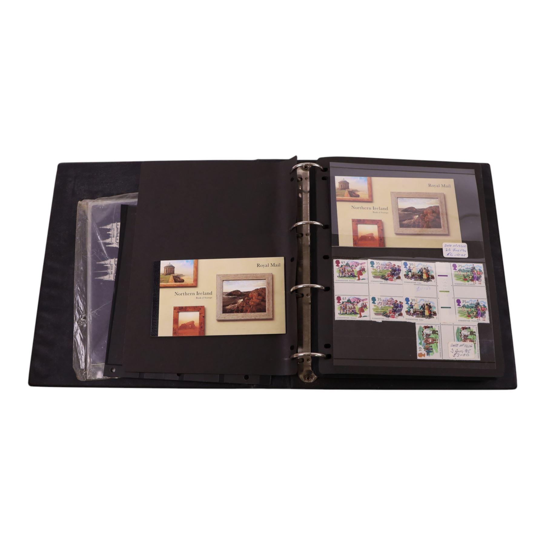 Queen Elizabeth II mint decimal stamps in four folders, face value of usable postage approximately 650 GBP