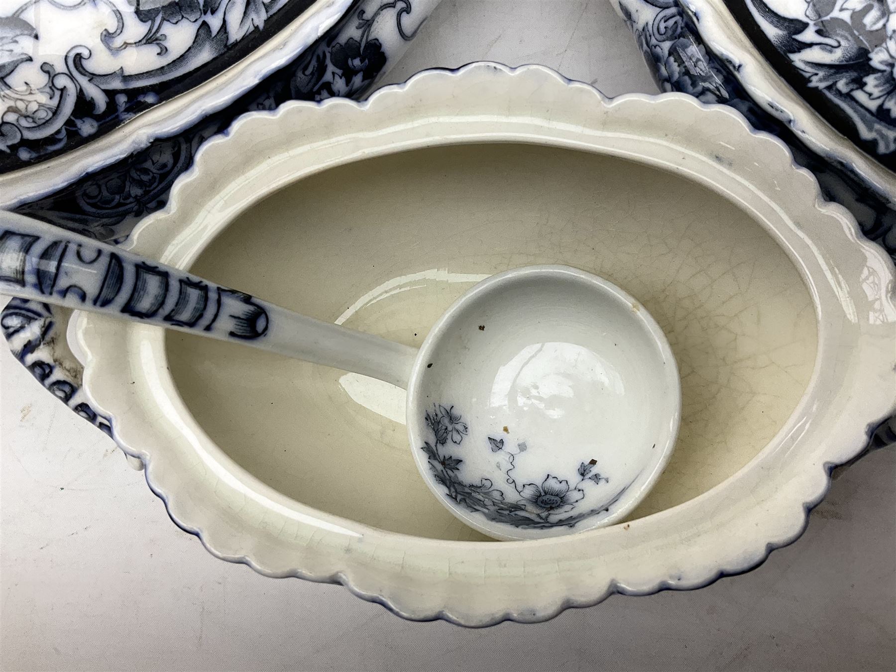 Late Victorian blue and white Chatsworth K Mayers & Co dinner wares, to include four lidded tureens, ladle, nine dinner plates, meat plate etc