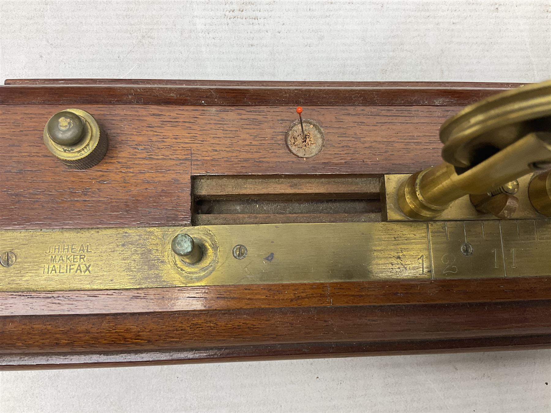 Early 20th century worsted spinners walnut and brass twist tester by J.H. Heal Maker Halifax L61cm; in original box with paperwork