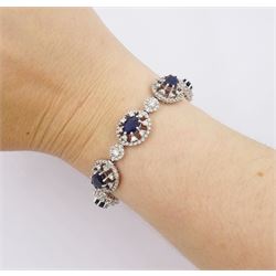 18ct white gold oval cut sapphire and round brilliant cut diamond bracelet, stamped 750, total sapphire weight approx 8.00 carat, total diamond weight approx 3.65 carat