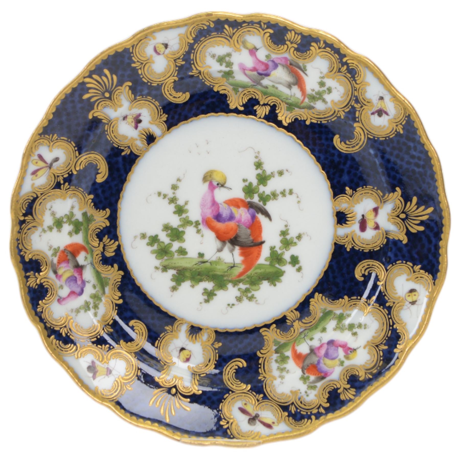 Late 19th/early 20th century Samson, Paris porcelain vase and cover, of baluster form, decorated after Worcester with gilt C scroll surround reserves painted with exotic birds, and insects and butterflies, upon a blue scale ground, H25cm, together two similarly decorated late 19th/early 20th century Samson, Paris cabinet plates, one example with spurious fret mark beneath, D22cm