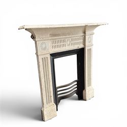 19th century Neoclassical design cast iron bedroom fire surround with fluted and rosette design, white painted finish with  black slip