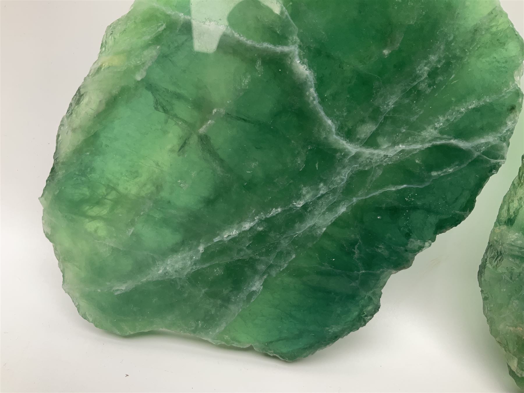 Pair of green fluorite slices, polished with rough edges, H16cm, L17cm  