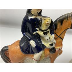 Staffordshire figure of a child riding a spaniel, together with pair of Staffordshire figures of children on horseback and a similar smaller example , child on spanial H22cm