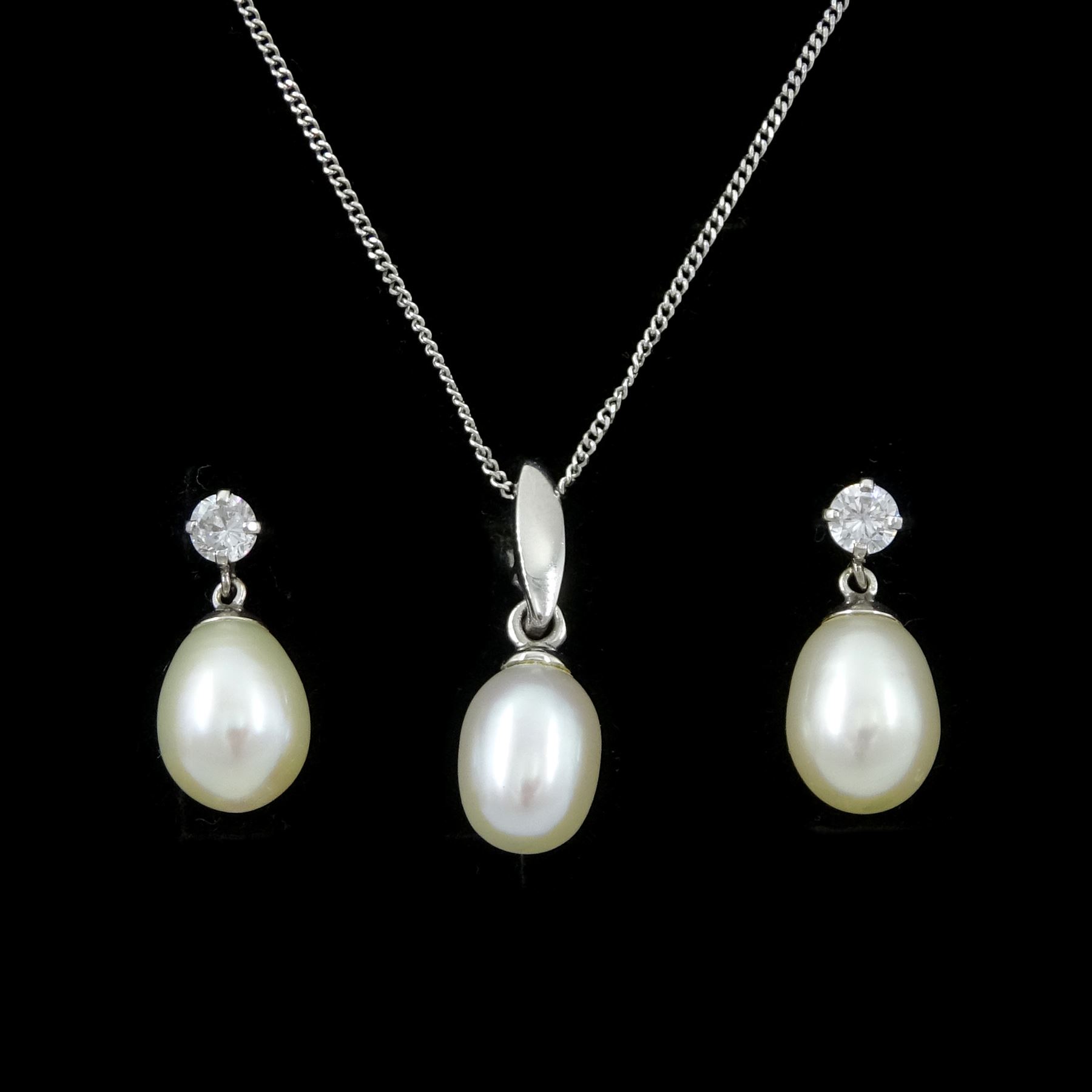 Pair of white gold pearl and cubic zirconia stud earrings and a white gold pearl pendant necklace, all 9ct
