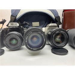 Four Minolta camera bodies, to include Dynax 500si, serial no. 94812651 with 'Signa Zoom 1;3.5-4.5 f=28-70mm' lens, Maxxum 300si, serial no. 97821665, with 'Tamron AF 80-210mm' lens and Dynax 300si, serial no 01603265'  with Minolta AF Power Zoom 35-80mm 1;4' lens, etc, together with Pantax MV1 camera bodies and other camera equipment 