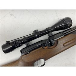 Weihrauch HW100 .22 calibre PCP repeating air rifle; walnut thumbhole stock with textured pistol-grip; Nikko Stirling Silver Crown 3-9x40 telescopic sight; integral sound moderator; No.1901181 L99cm overall; in gun sling; with Logun Combi-Pump and quantity of pellets