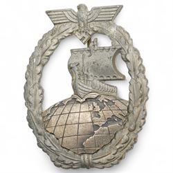 German Third Reich Krim shield arm badge 1941-1942, Auxiliary Cruiser badge and a WWI first class Iron Cross with field conversion (3) 