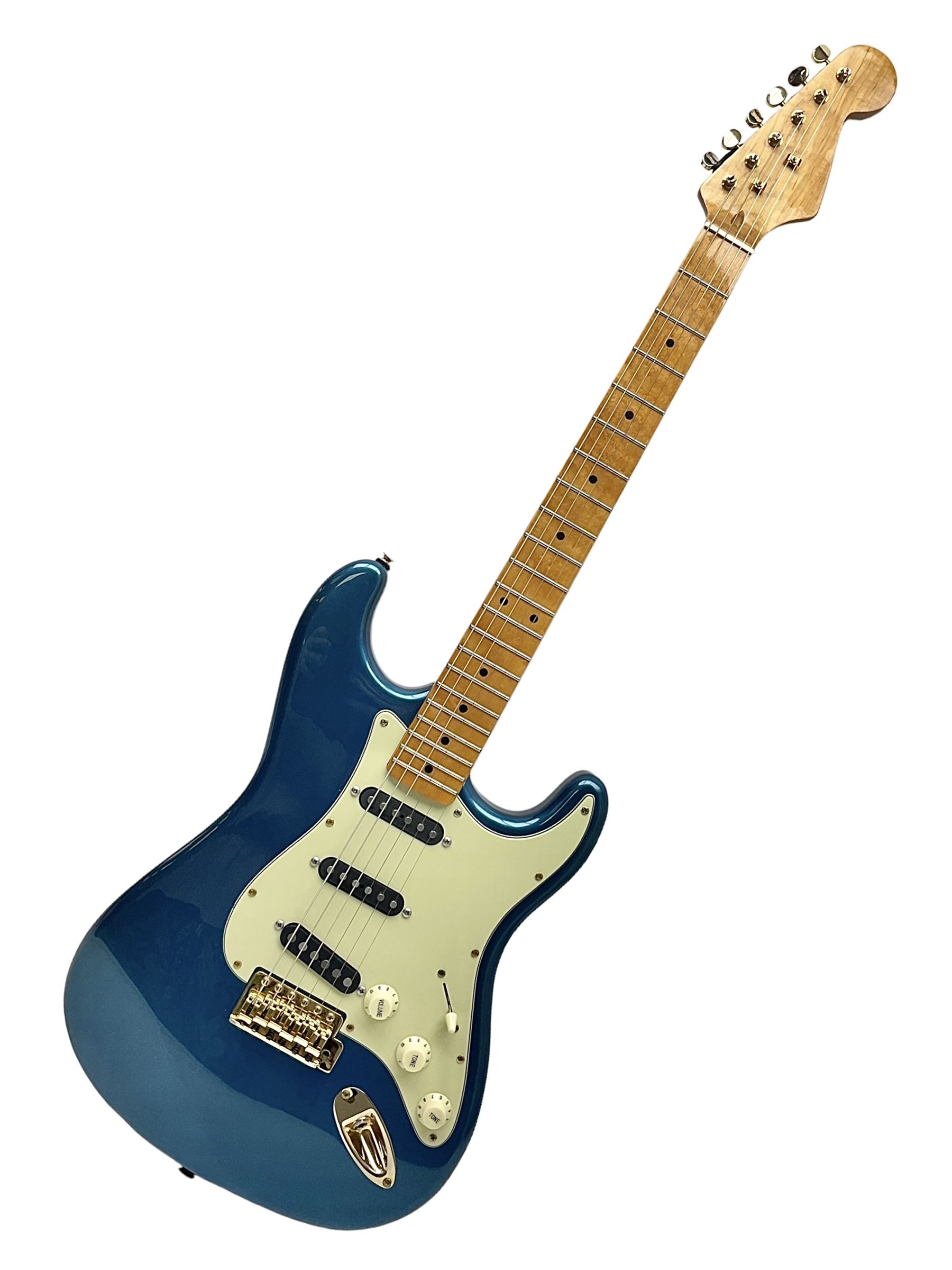 Fender Stratocaster style electric guitar in metallic blue with Rio Grande pick-ups and Fender back-plate L98cm; in Fender soft carrying case