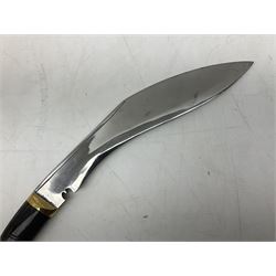 Ceremonial kukri, the 28.5cm curving blade inscribed 'O RDEP NEPAL 9/81' with brass mounted horn grip; in gloss black scabbard with two skinning knives 41cm overall