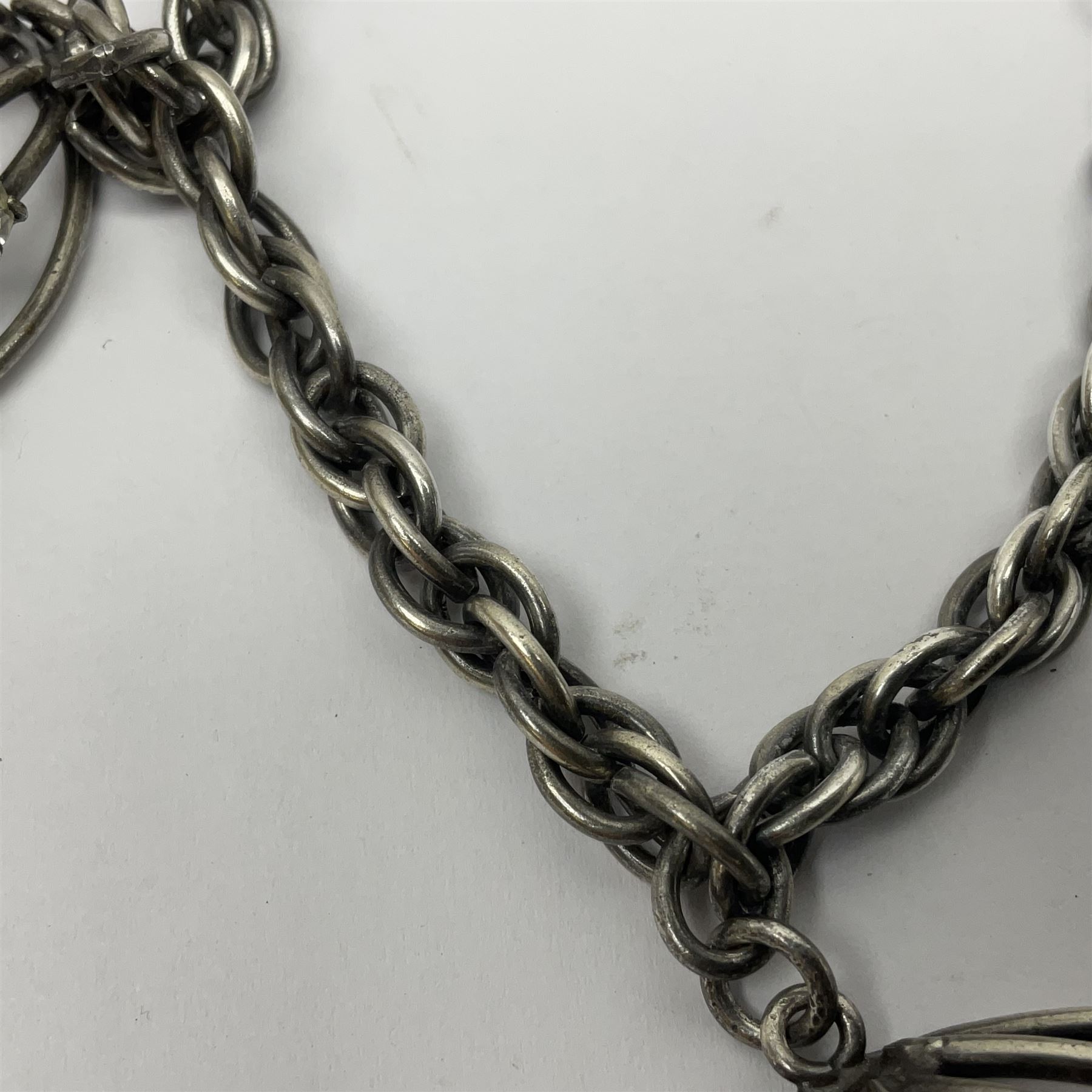 Joseff of Hollywood, circa 1950s metal and white paste necklace, with three graduated pendant drops set with white paste, to a Prince of Wales chain, signed with round script tag