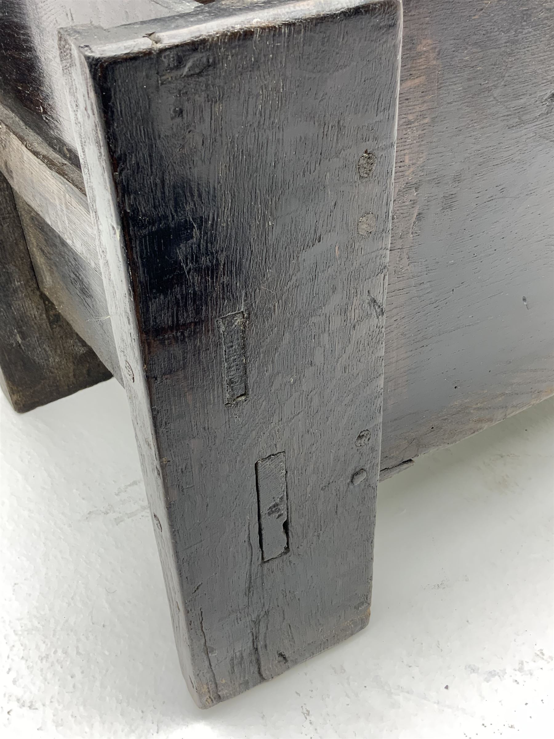 17th century vernacular oak boarded and joined clamp-front coffer or ark chest, enclosed by hinge lid, vertical stile supports