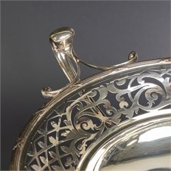 Early 20th century silver twin handled tazza, the bowl of circular form with pierced foliate decoration and ribbon and reed border, with two whiplash curved handles, upon a knopped stem and pieced foliate foot, hallmarked Walker & Hall, Sheffield 1911, H20cm