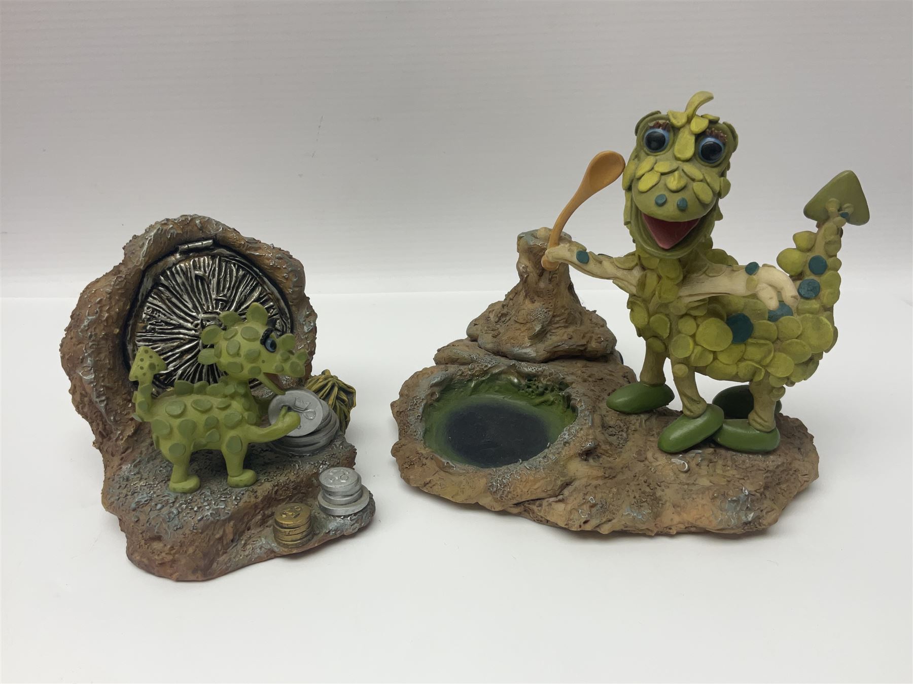 Eleven Robert Harrop figures from various collections, comprising limited edition The Trumpton Fire Engine Musical Box CGMB8 no. 359/1000, The Dragon from the Red Knight BN09, Bulldog Fireman DP165, Pointer Fire Chief DP184, Dalmatian New York Fire Fighter DP234, Dalmatian Fire Fighter DP191; Desperate Dan ‘Fireman Dan’ BDS11, Cuthbert CG13, Pugh (Clarinet) CG70, The Soup Dragon CL05 and Baby Dragon CL06