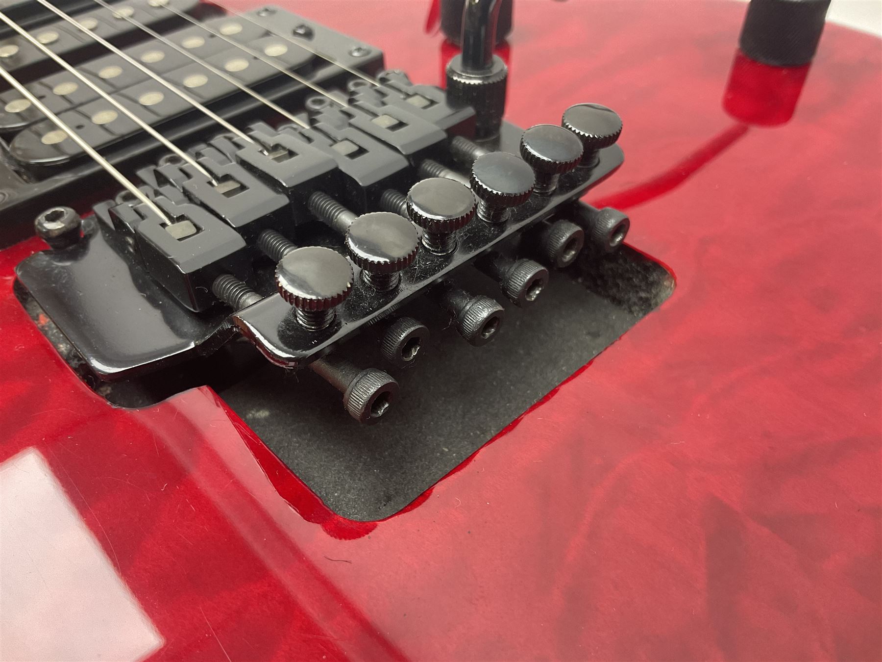 Maverick HSH rock guitar with Floyd Rose tremolo, L100cm overall; in soft carrying case.