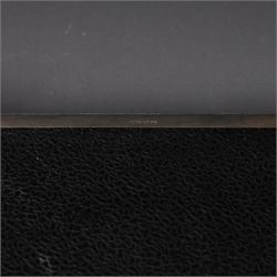 1960s silver mounted cigarette box, of rectangular form with engine turned decoration, upon four bracket feet, with presentation engraving to interior lid reading  'British Aircraft Corporation (Operating) Limited Commemorating the Queen's Award to Industry 1967, hallmarked James Geraghty, Birmingham 1965, with retailers mark for Asprey, W16.5cm, H4.5cm