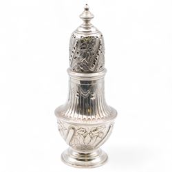 Victorian silver sugar caster, of typical waisted form with engraved and embossed floral a...
