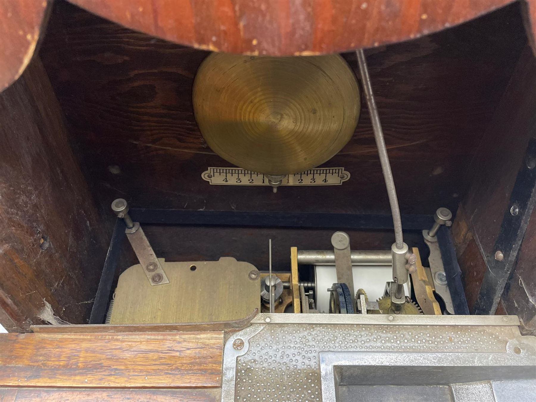 Early 20th century oak cased time recorder, circular Roman dial signed 'Time Recorders Leeds Ltd. Park Lane & Oxford Row Leeds', the glazed door signed 'National Time Recorder Co Ltd. London...'