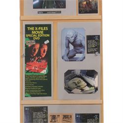 The X Files montage, including cast images, stills and advertisements, within acrylic frame, together with a Judge Dredd montage, including comic cover and comic strips, largest 46x61cm

Notes: This item is from the private collection of Arthur C. Clarke's brother.