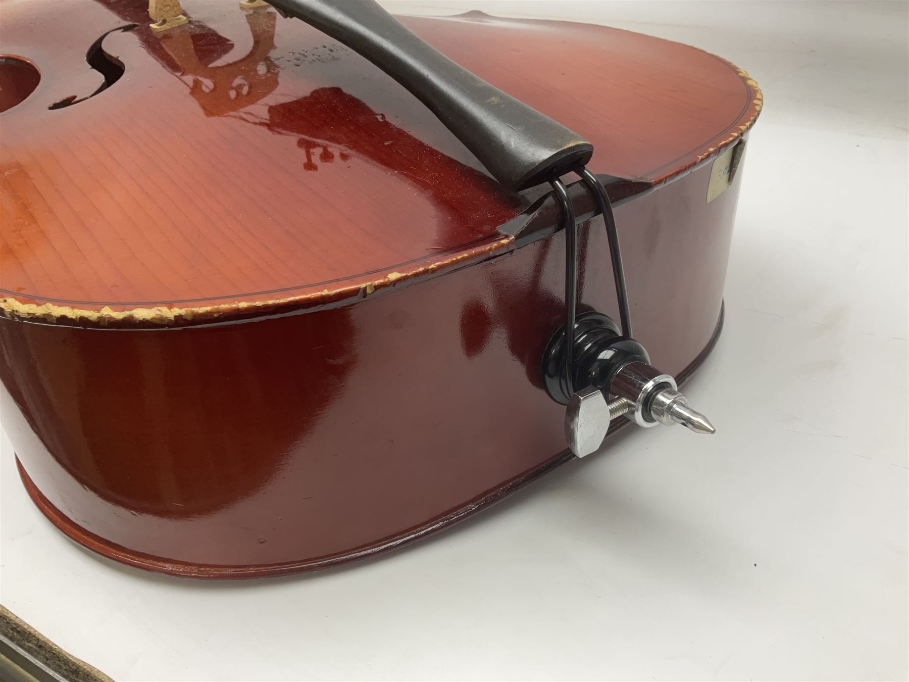Two student half-size cellos - Boosey & Hawkes Artia with 65cm one-piece back and spruce top; bears maker's label; L104cm overall; and Romanian with 65.5cm two-piece maple back and ribs and spruce top; bears label; L108.5cm overall; each in soft carrying case with two bows (2)