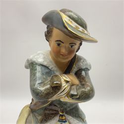 Royal Crown Derby figurine, Winter, modelled as a man with crossed arms on ice skates, by M. Townsend, with printed marks beneath, H24cm