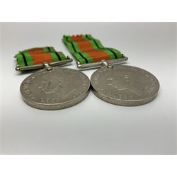 Ten WW2 medals comprising two 1939-1945 war medals, two Defence medals, two 1939-1945 Stars, two Africa Stars, France & Germany Star and Burma Star; together with bar of four miniature medals; all with ribbons