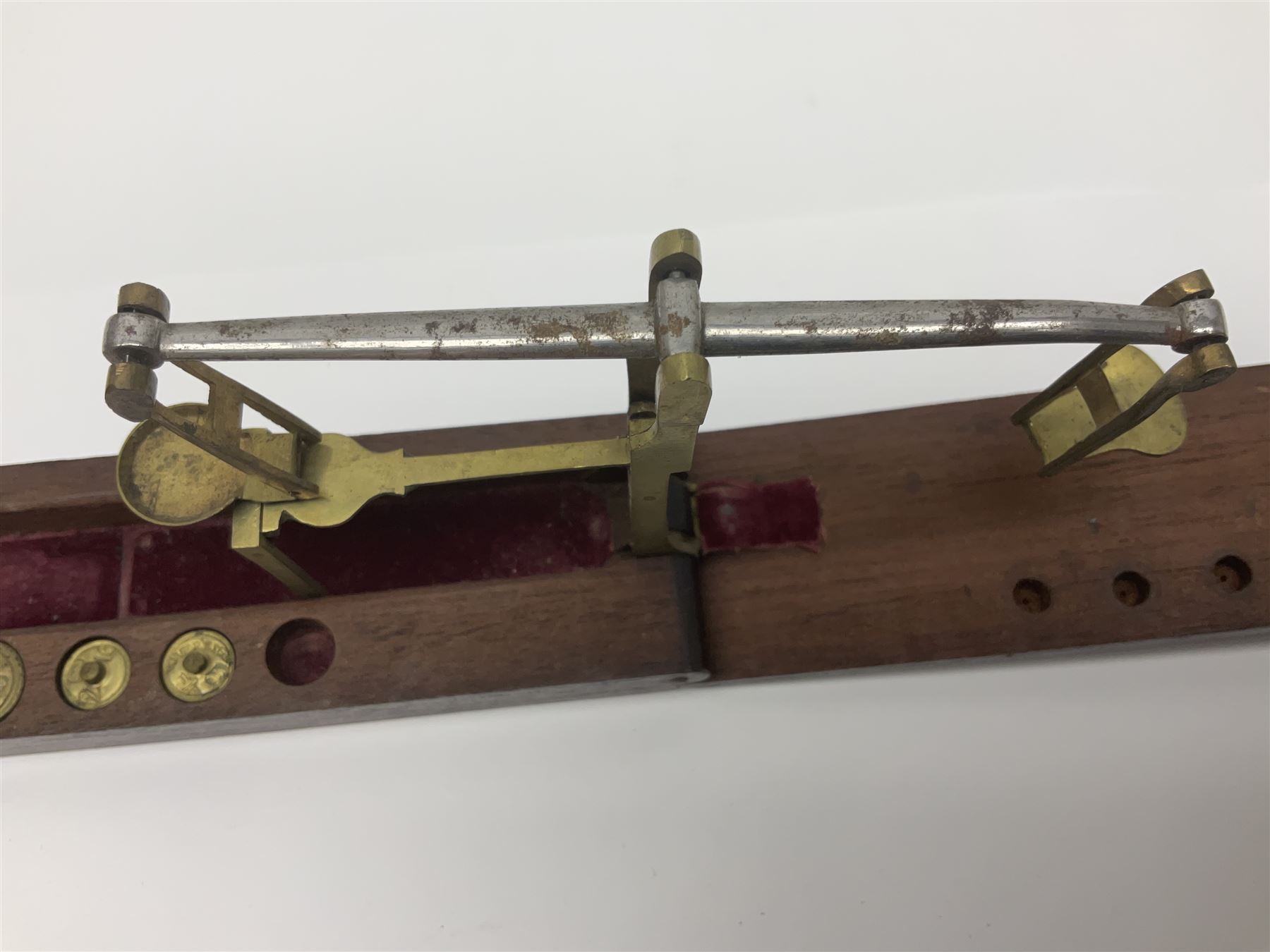 Brass sovereign scales and a part set of Georgian folding sovereign scales (one weight missing)