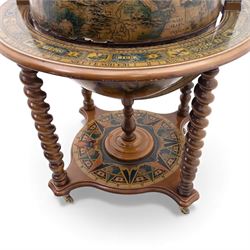 20th century Italian reproduction globe drinks table, the cartographic sphere decorated with Renaissance-style map scenes, hinged upper section enclosing bottle storage, with printed zodiac and calendar ring to the top, on spiral-turned legs joined by a compass rose undertier, brass castors below