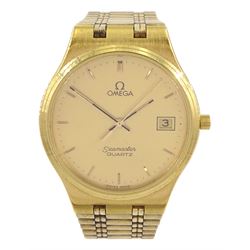 Omega gentleman's gold-plated and stainless steel quartz wristwatch, 196 0235, champagne dial with baton hour markers and date aperture, on original Omega gold-plated bracelet, with fold-over clasp