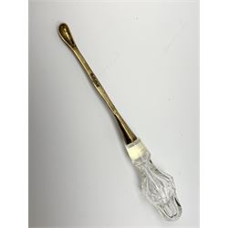 A group of Victorian glass condiment bottles, to include a set of four bottles and jar with cut decoration, one bottle with pierced silver domed top, another bottle with silver gilt spoon top, and jar with silver domed hinged cover, all hallmarked Robert Harper, London 1868. (8). 