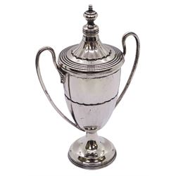 Small mid 20th century silver twin handled trophy of urn form, with cover, hallmarked Walker & Hall, Sheffield 1937, H11.5cm, approximate weight 2.78 ozt (86.6 grams)