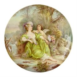 Late 19th century porcelain plate, hand painted by Frederick Sutton, depicting a female figure and putto within a wooded landscape, with recumbent sheep and brook to the fore, signed F N Sutton, unmarked verso, D22.5cm

Frederick Sutton was employed as a painter at the notable factories of Royal Worcester, Coalport, and Minton. 