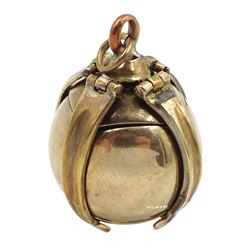Early 20th century gold and silver Masonic ball pendant/charm, stamped 9ct