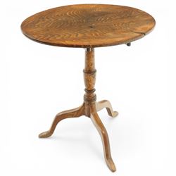 George III figured elm wine table with oval flip-top, raised on turned vasiform pedestal with tripod base