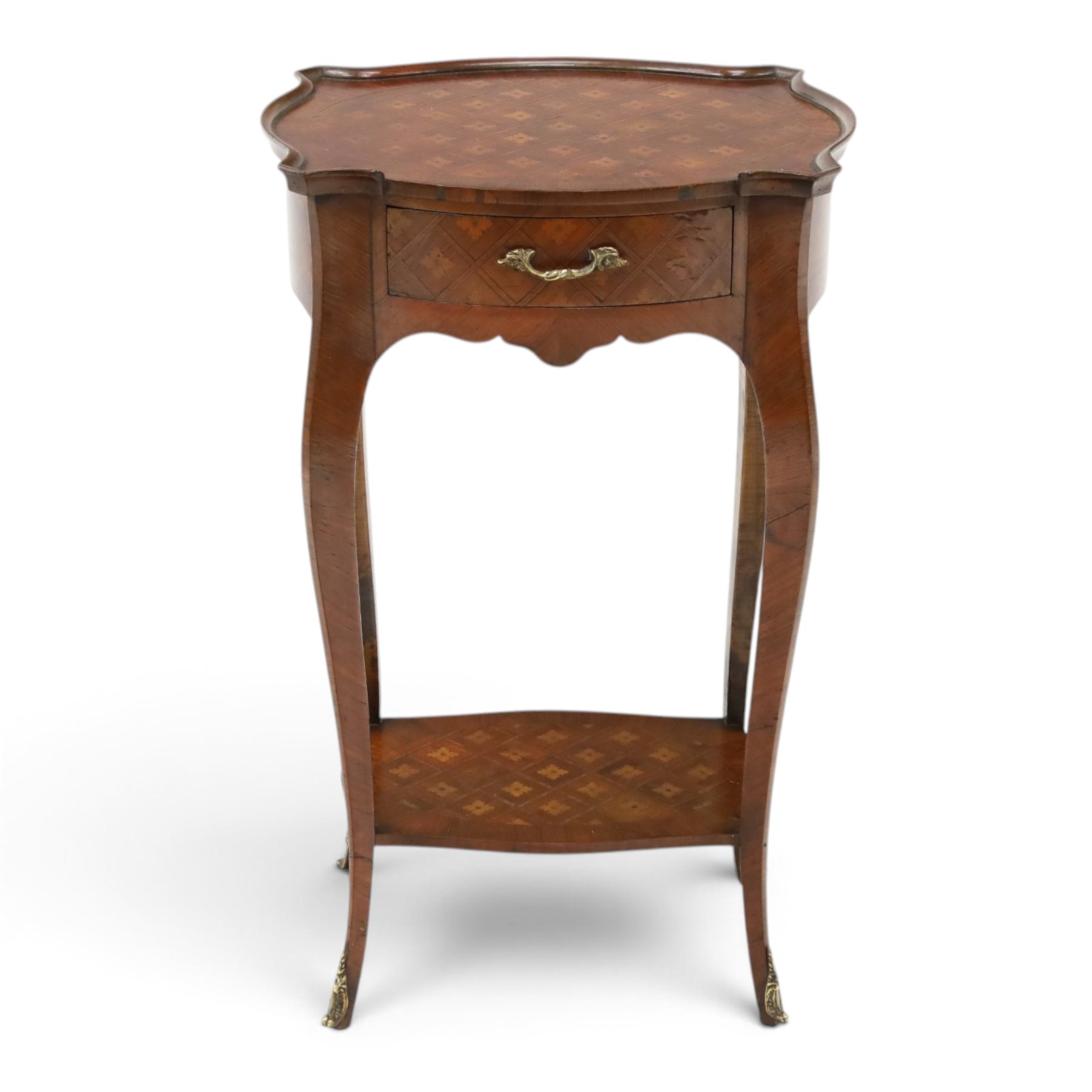 Small French inlaid marquetry and parquetry occasional table or bedside, the shaped top with raised moulded edge and chequered inlay top with crossbanding, fitted with single frieze drawer with gilt-metal handle, raised on cabriole supports united by undertier