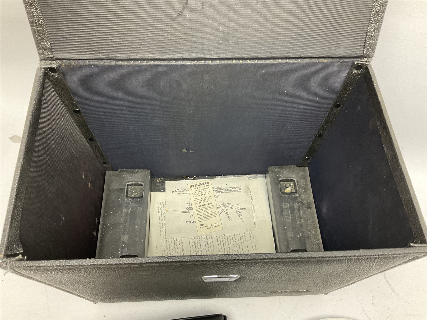 Elmo ST-1200 sound film projector, with instruction manual and black carrying case