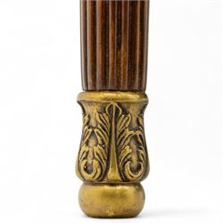 Maitland Smith - Pair of mahogany side tables, the rectangular top with rounded corners, the top edge inlaid with movingui wood, above two under-tier shelves, and frieze drawer, supported on stop-reed and acanthus foliate carved legs united by platform stretcher, raised on brass sabot foot caps