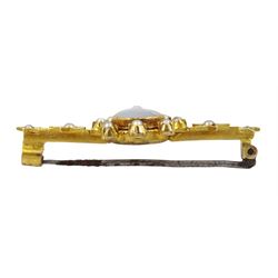 Victorian 15ct gold moonstone and seed pearl brooch, the carved 'Man in the Moon' moonstone with pearl surround and two pearl set stars set either side