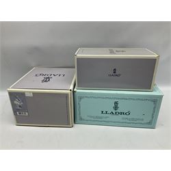 Six Lladro figures, comprising Naughty Dog no 4982, Best Friend 7620 and My Buddy no 7609, Kitty Confrontation no 1442, It Wasn't Me no 7672 and Rabbit Eating no 4772, three with original boxes, largest example H22cm