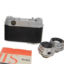 Kodak Retina III S camera outfit, comprising camera body serial no. 51394, three Schneider-Kreuznach lenses including Retina-Xenon f:1.9/50mm, Retina-Curtagon f:2.8/35mm and Retina-Tele-Arton f:4/85mm, viewfinder, close up rangefinder, filters and hood, contained within a brown Kodak carry case