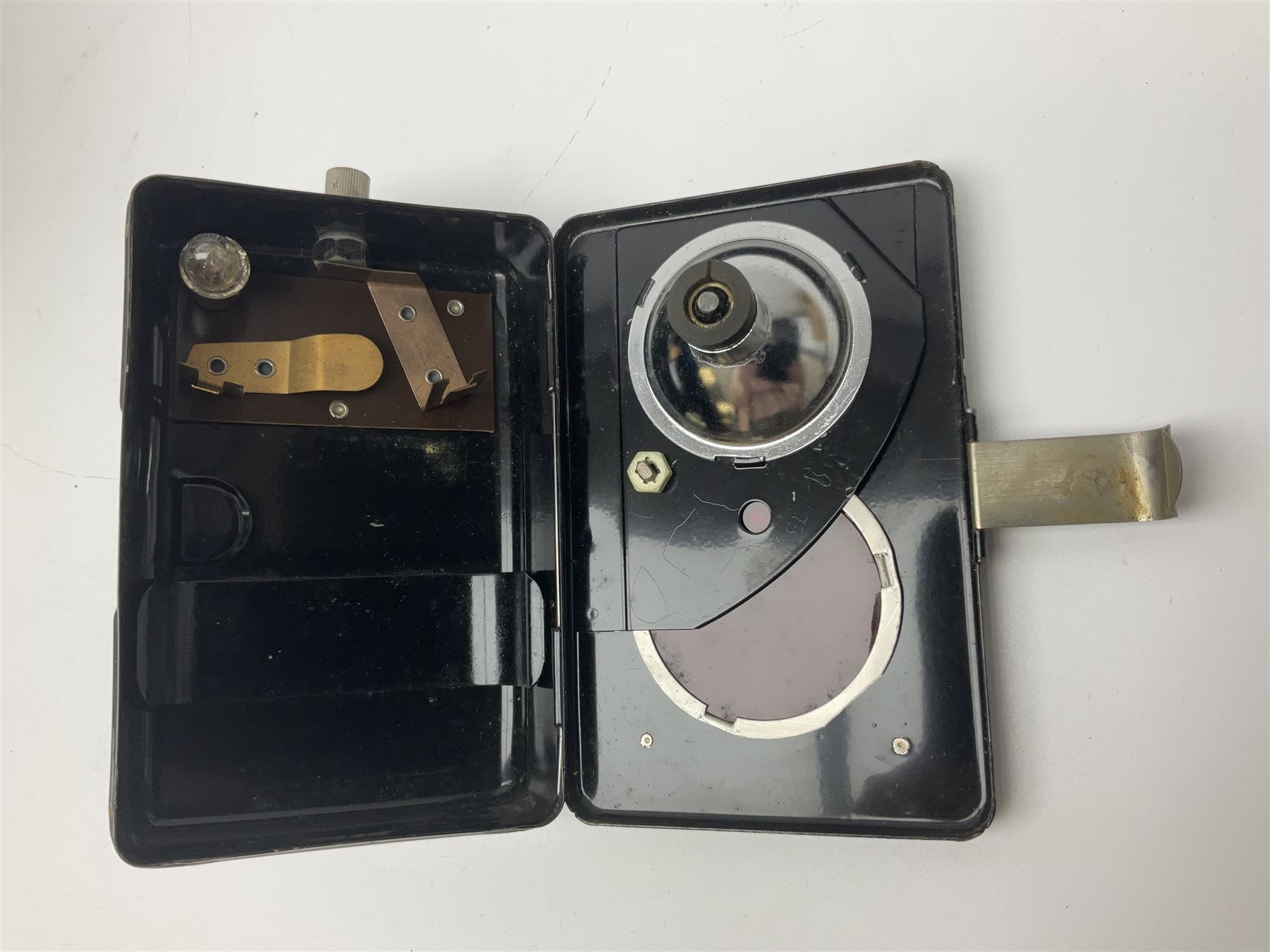 Police - Victorian turned hardwood truncheon with traces of decoration and VR cypher L42cm; Humberside Police helmet with Queens Crown helmet plate; hand lamp inscribed 'The Inspector'; and small pair of pewter figures of police officers (5)